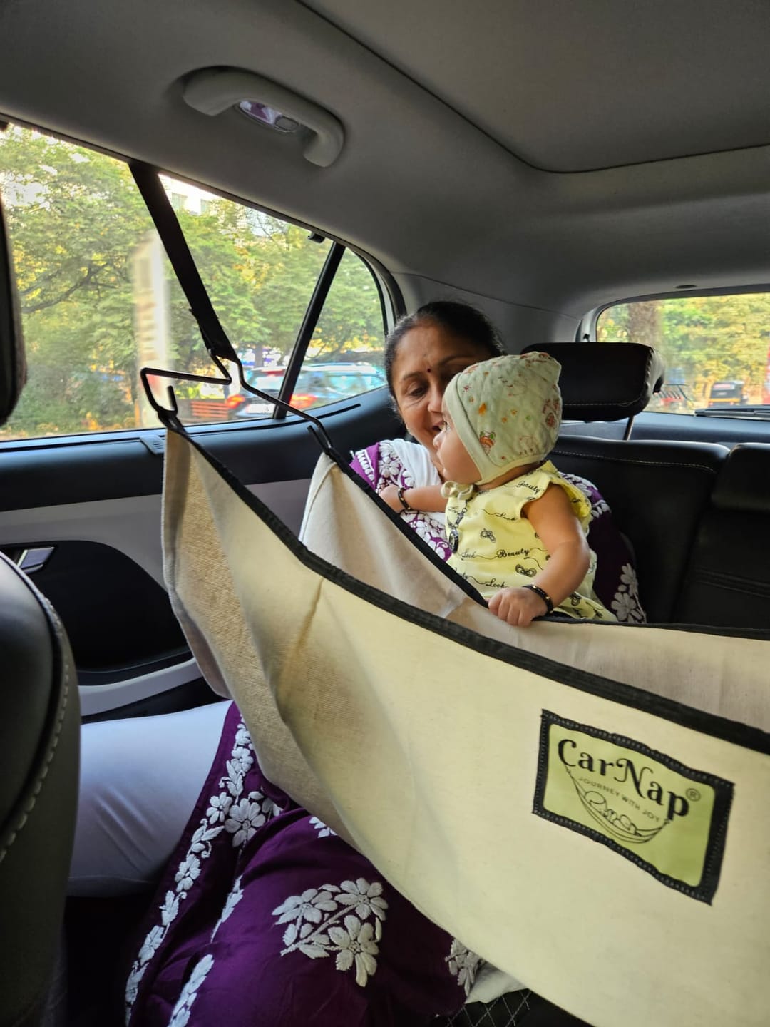 Customer photo review of CarNap - Portable Car Hammock for 0 to 3 year baby | with Adjustable Belt, Hammock Cloth, Hangers and Carry Bag
