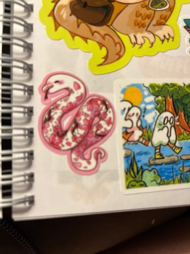 Customer photo review of Colored Tattooed Snakes Sticker Sheet