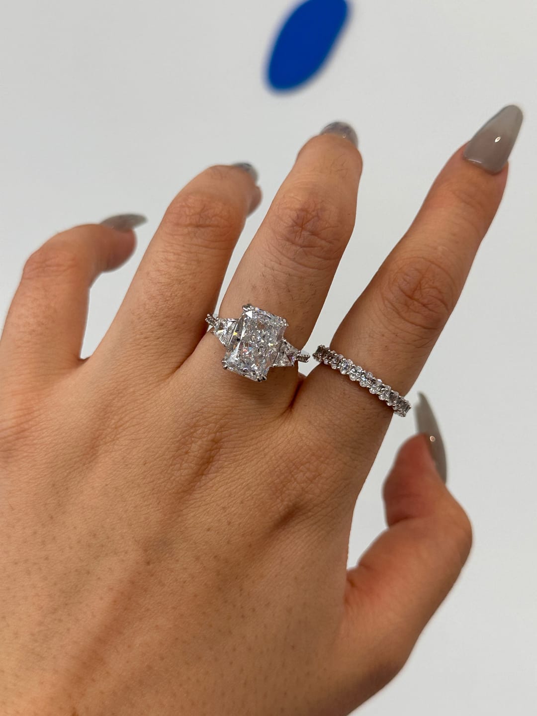 Customer photo review of Louily Gorgeous Three Stone Crushed Ice Radiant Cut Engagement Ring