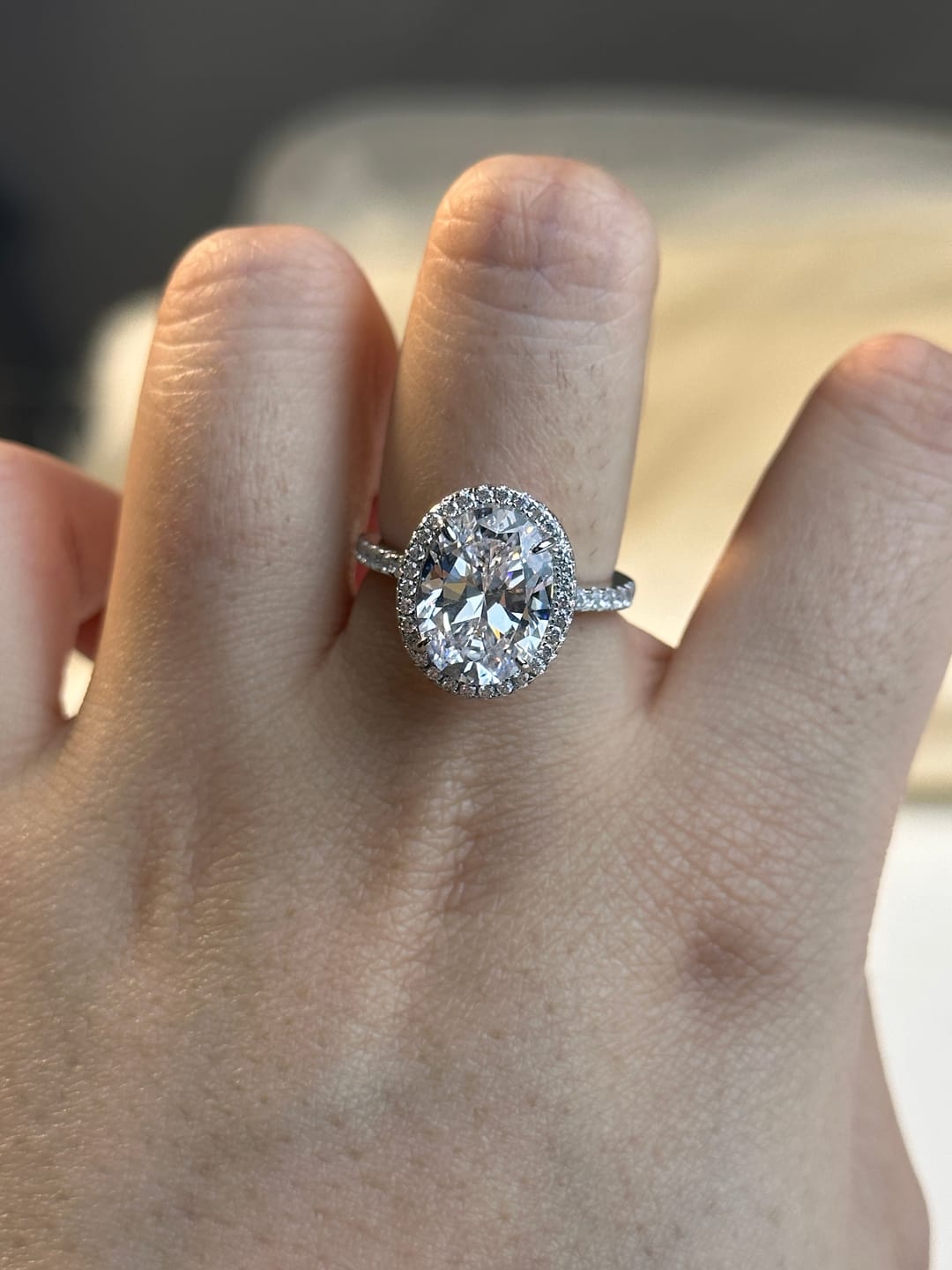 Customer photo review of Louily Halo 3.5Ct Oval Cut Simulated Diamond Engagement Ring In Sterling Silver