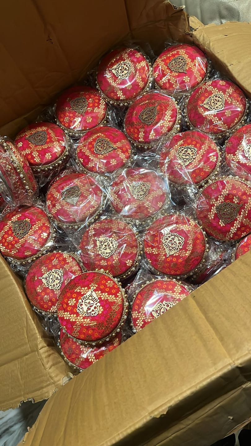 Customer photo review of LAMANSH Designer Mataji 🕉️ steel ladoo boxes in stainless steel and banarasi fabric | Return Gifting 🎁 for haldi mehendi and wedding ceremony (Organza bag included)