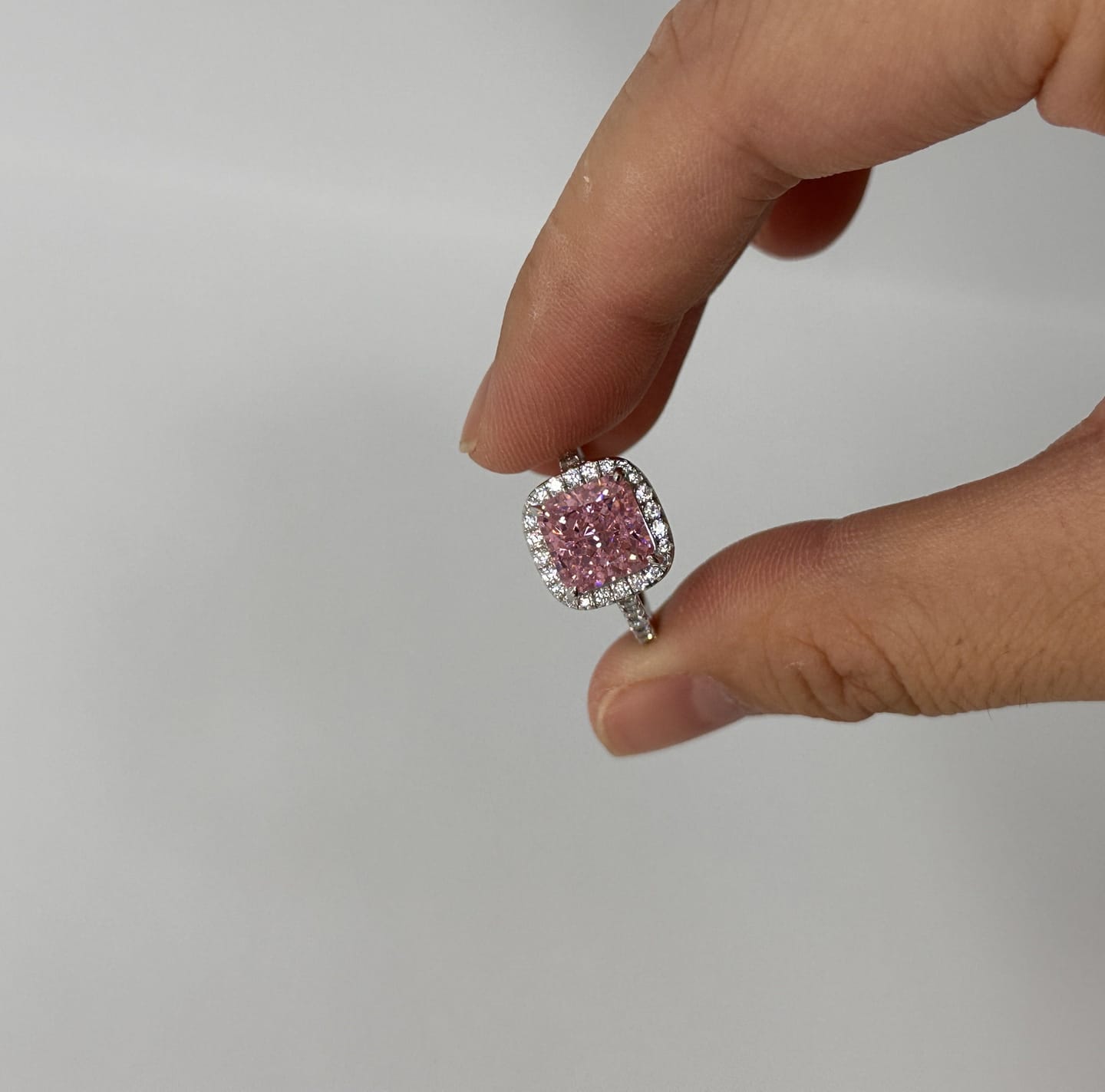 Customer photo review of Louily Lovely Halo Radiant Cut Pink Stone Engagement Ring