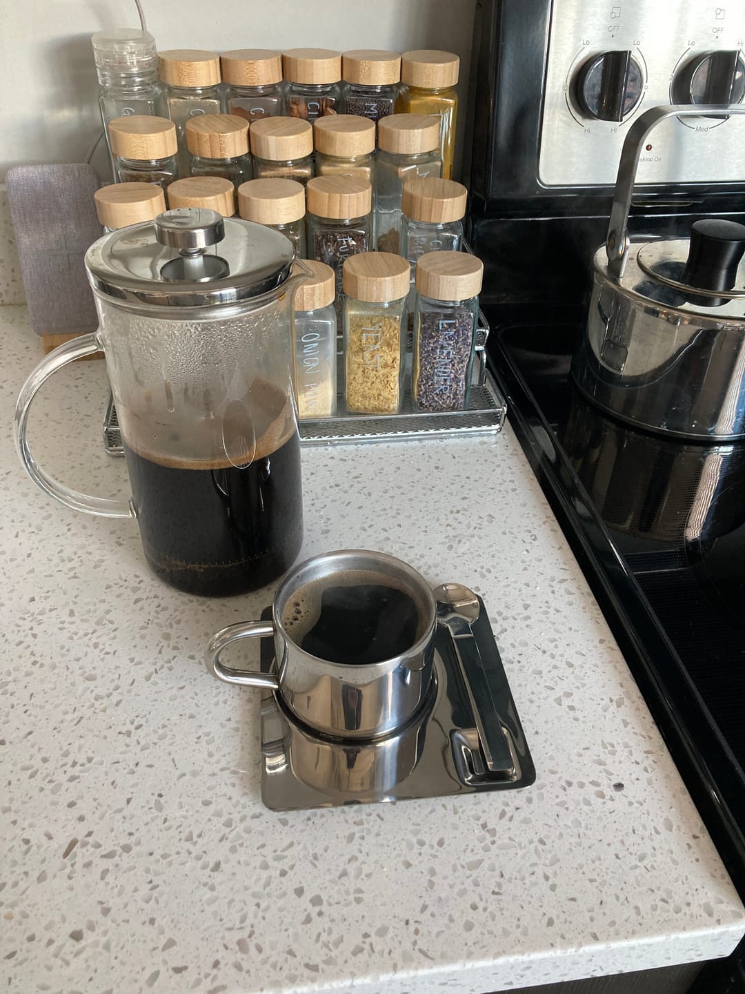 Customer photo review of Steel Coffee Cup with Square Saucer & Spoon