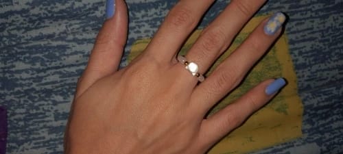 Customer photo review of Obsidian & Moonstone Cat Resizeable Bead Rings