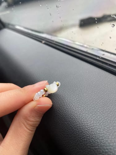 Customer photo review of Obsidian & Moonstone Cat Resizeable Bead Rings