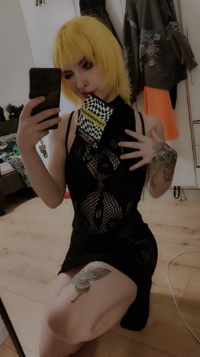 Customer photo review of Fishnet sleeveless hollow out high neck see through mini dress goth Alternative Darkwave Fashion