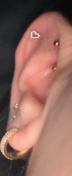 Customer photo review of Heart Piercing | Titan