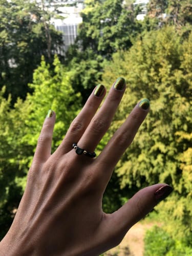 Customer photo review of Obsidian & Moonstone Cat Resizeable Bead Rings