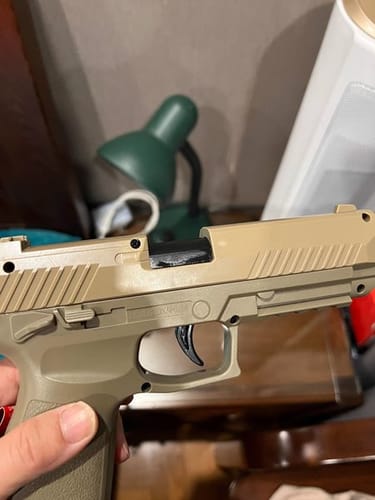 Customer photo review of Beretta M92 & SIG Sauer M320 Auto Shell Ejection Toy Gun