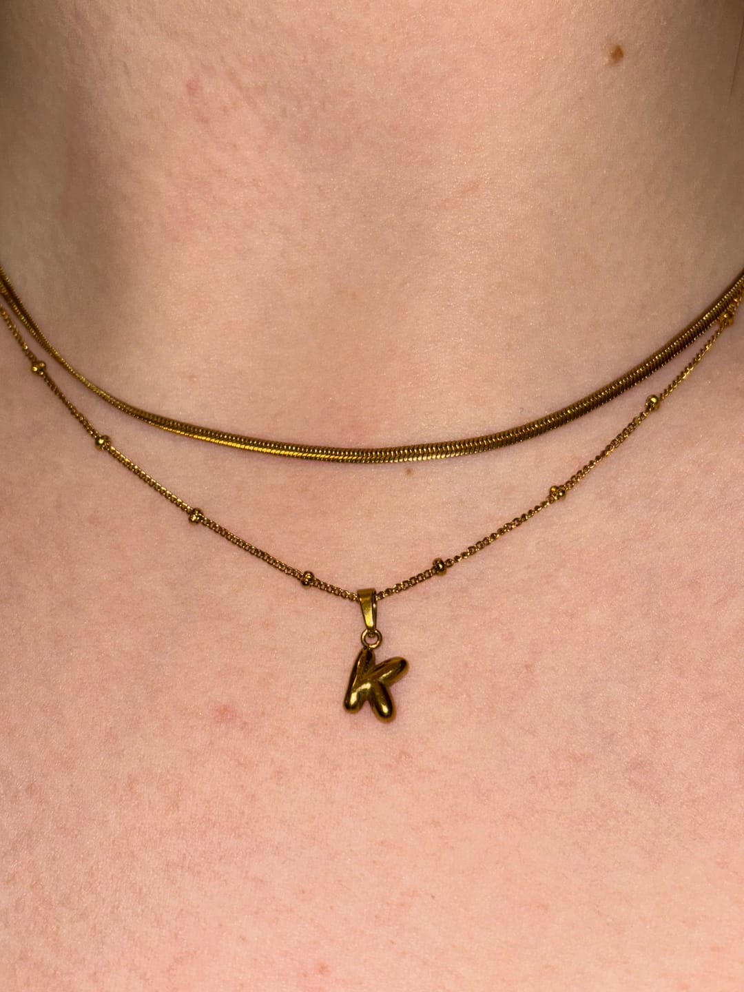 Customer photo review of Tiny bubble initial necklace