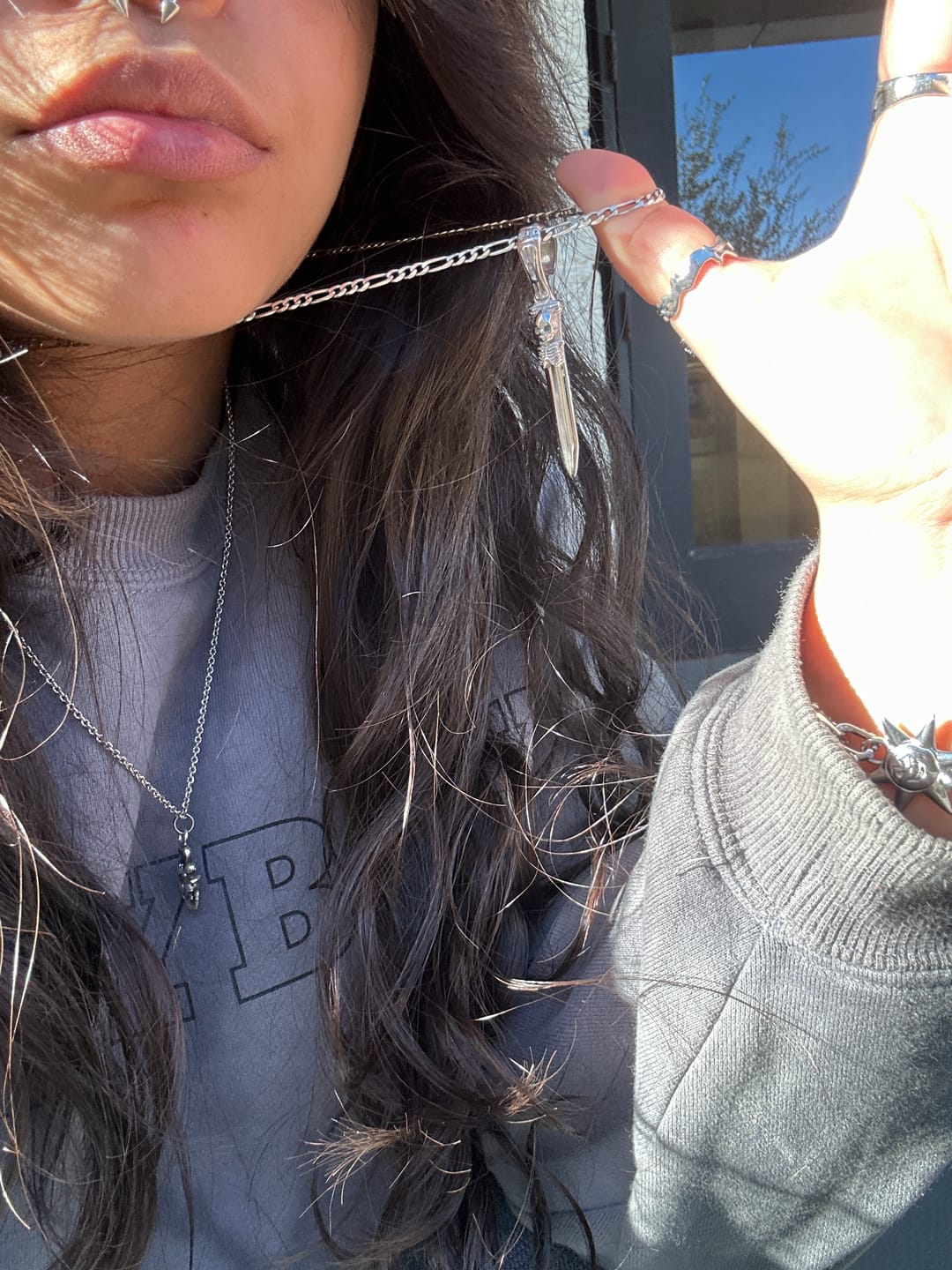 Customer photo review of CATACOMB SWORD PENDANT