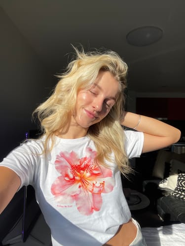 Customer photo review of 'Flower Girl' premium baby tee