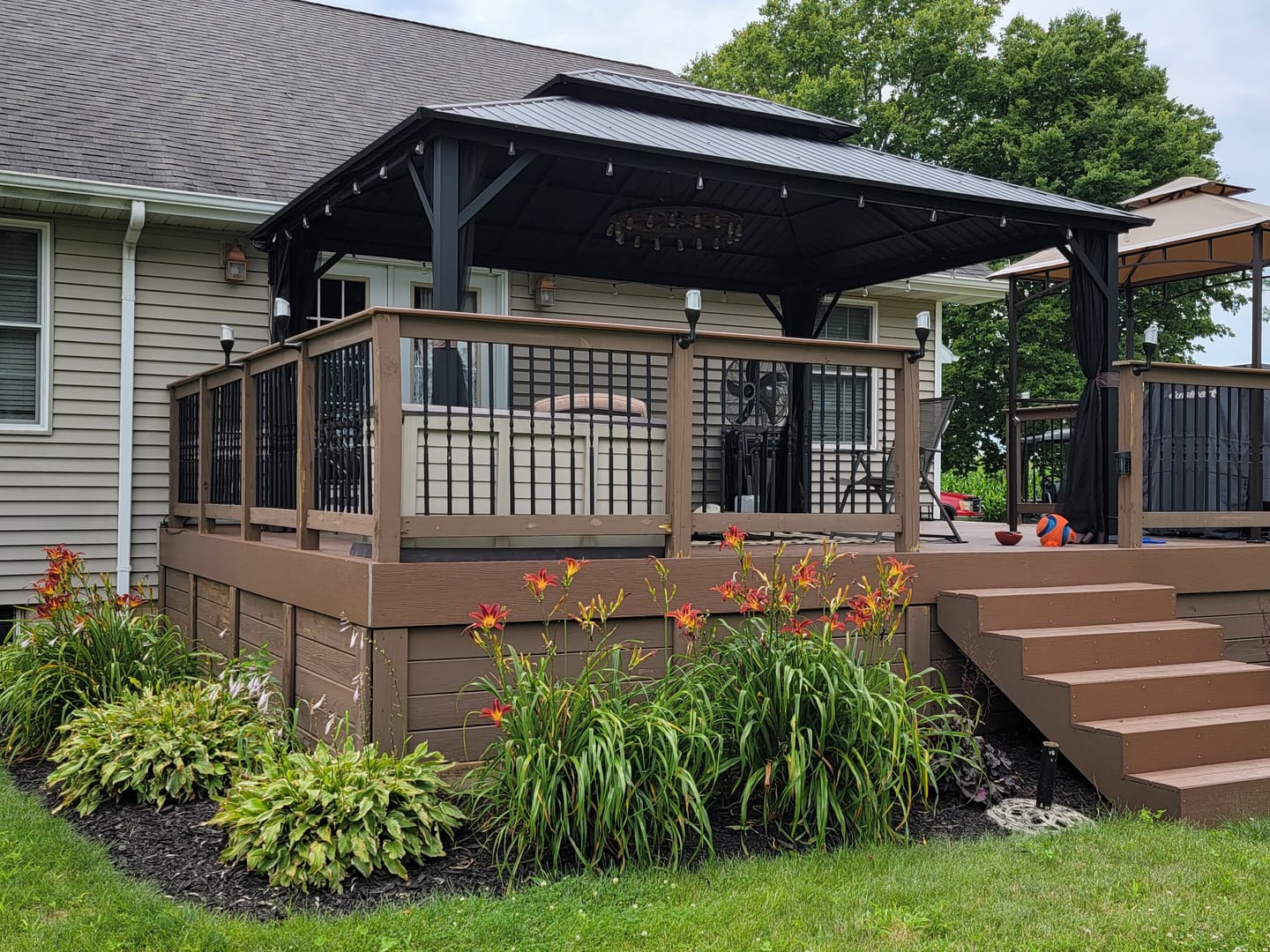 Customer photo review of Shade N' Shelters 12' x 16' Duncan Hardtop Gazebo Privacy Curtain with Hooks