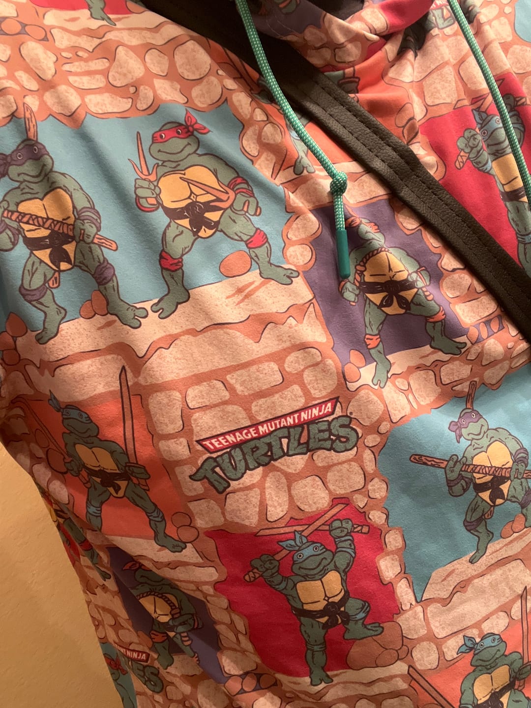 Customer photo review of Teenage Mutant Ninja Turtles "Cowabunga Covers" – Performance Hoodie