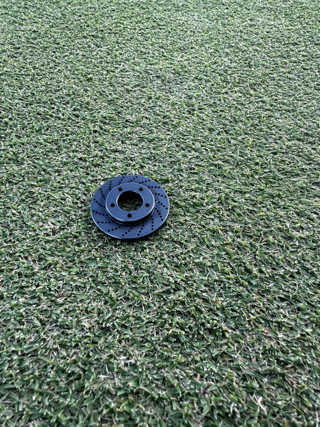 Customer photo review of Rotor Golf Ball Marker - Black Oxide Carbon Steel | Kraken Golf