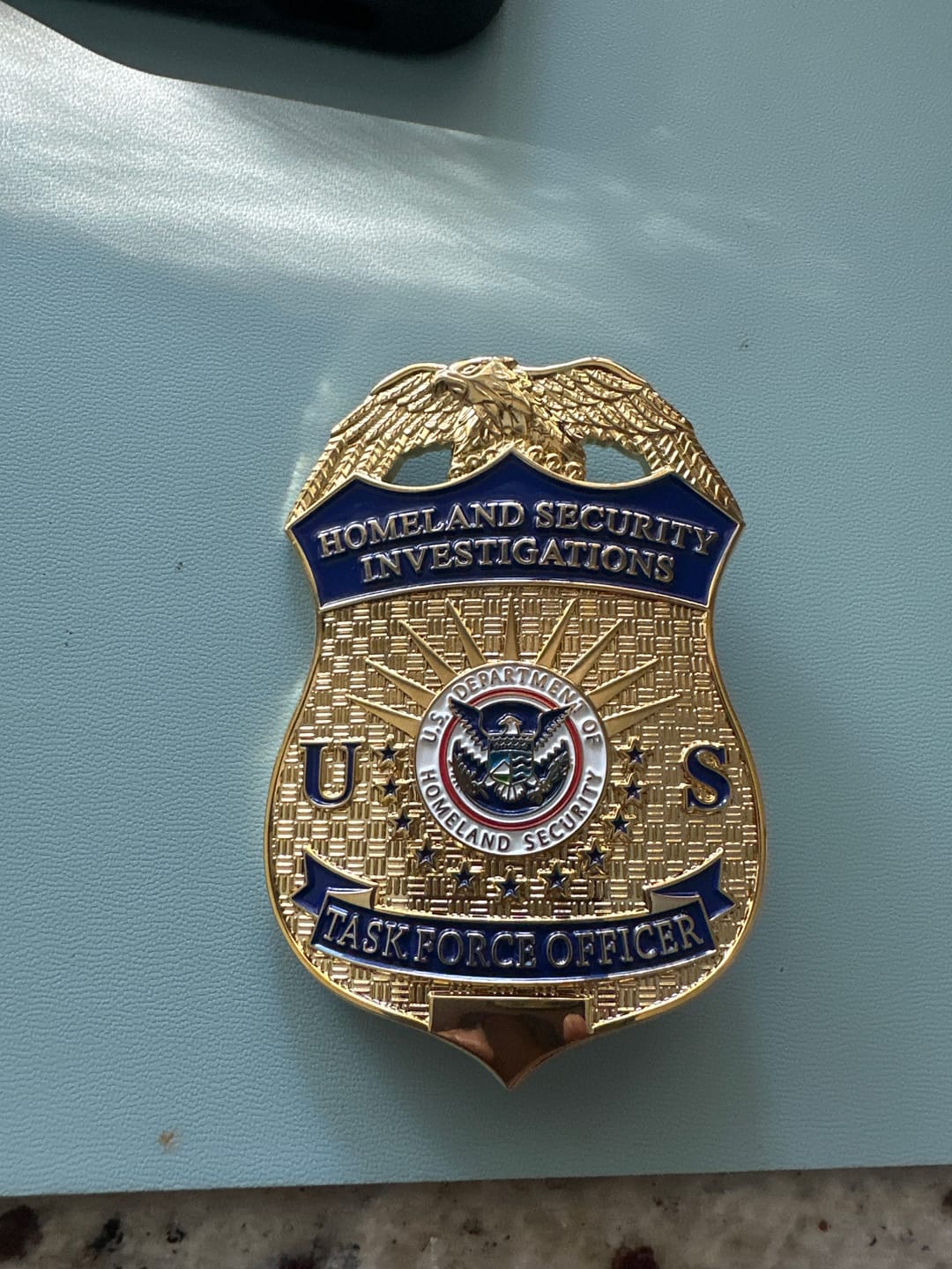 Customer photo review of US HSI TFO Task Force Officer Badge Homeland Security Investigations Replica Movie Props Gold