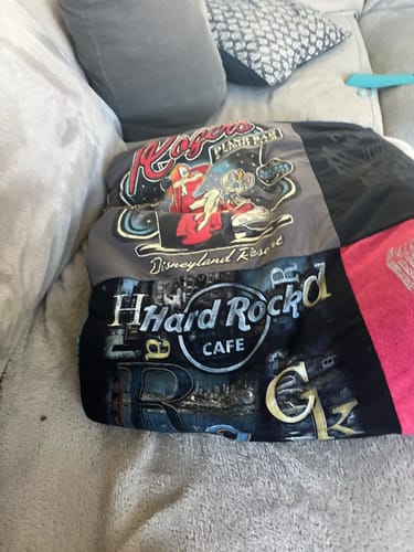 T-shirt quilt with disney, music themes by Douglas from CA