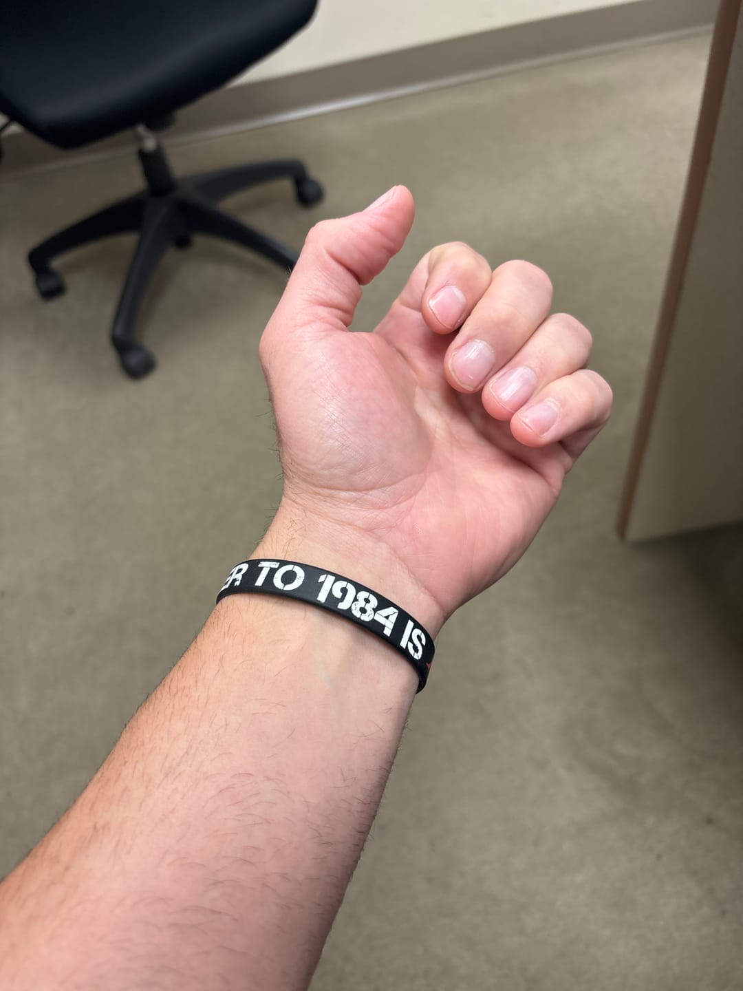 Customer photo review of The Answer to 1984 Wristband