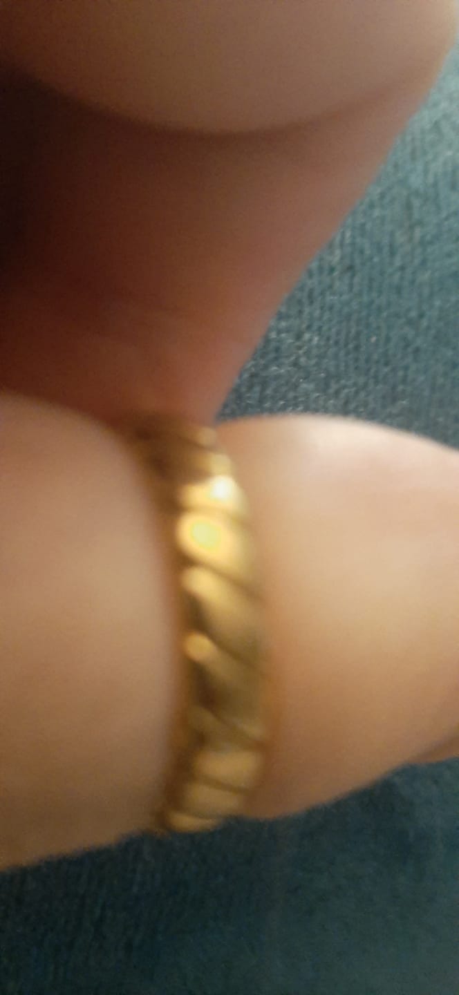 Customer photo review of Calira Twisted Infinity Ring