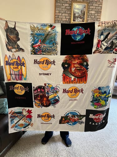 T-shirt quilt with music, travel themes by Debbie from IN