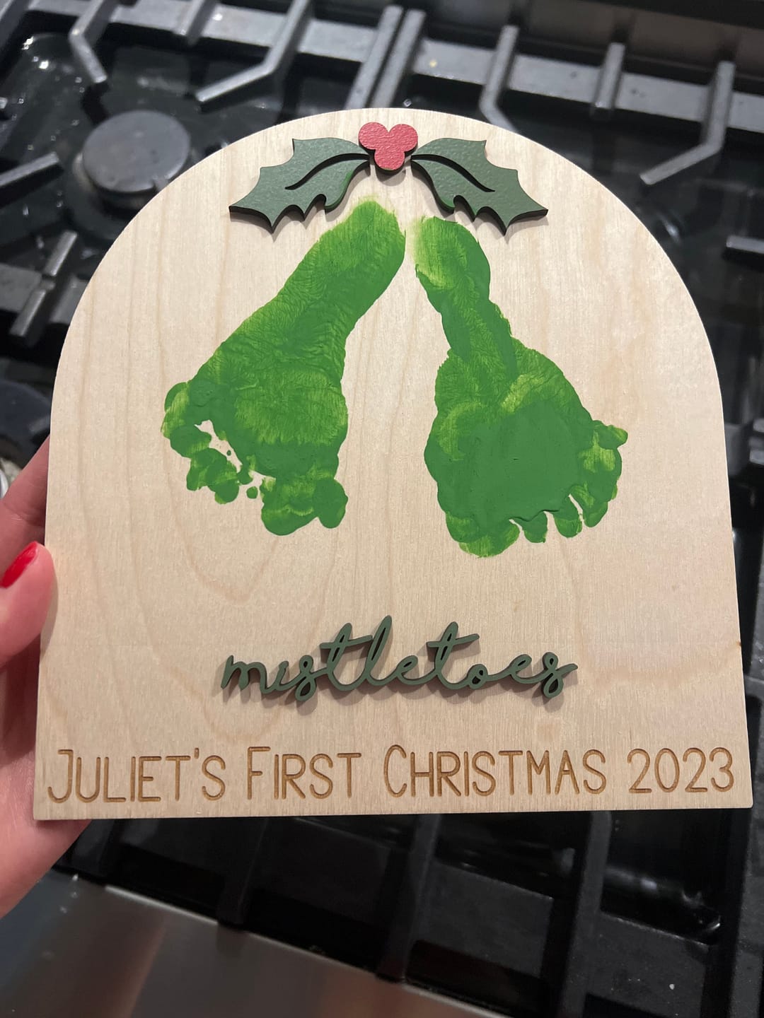 Customer photo review of Baby's First Christmas Mistletoe Footprint Craft