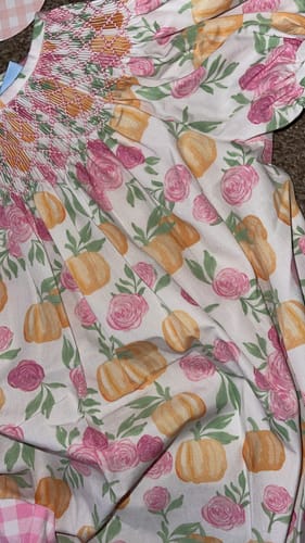 Customer photo review of Pink Floral Pumpkin Smocked Bishop Dress