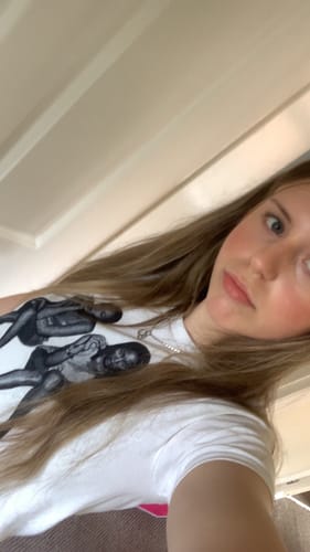 Customer photo review of 'After Party' premium baby tee