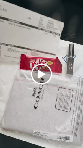 Customer video review of Corner Zip Wristlet (Silver/Red)