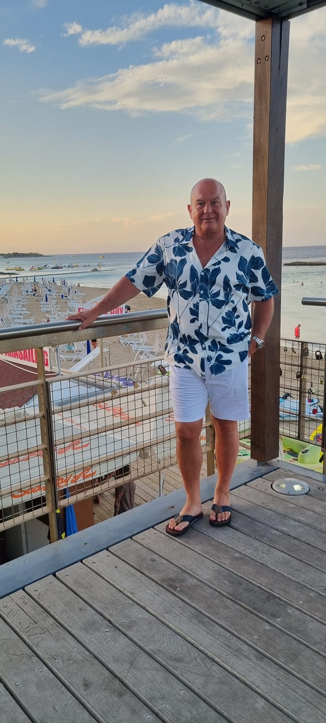 Customer photo review of Men's Summer Casual Floral Button Up Short Sleeve Holiday Cool Beach Shirt