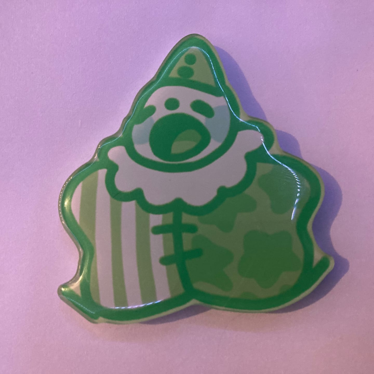 Customer photo review of Lil Green Clown Phone Grip