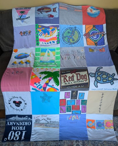 T-shirt quilt with traveling, outdoor activities themes by Christina from GA