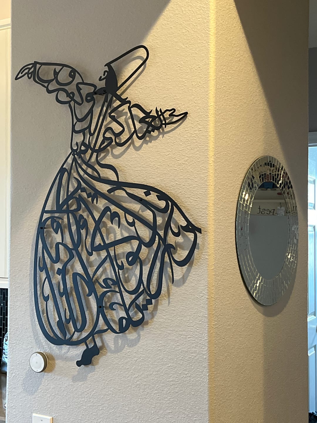 Customer photo review of Whirling Dervish Metal Islamic Wall Art