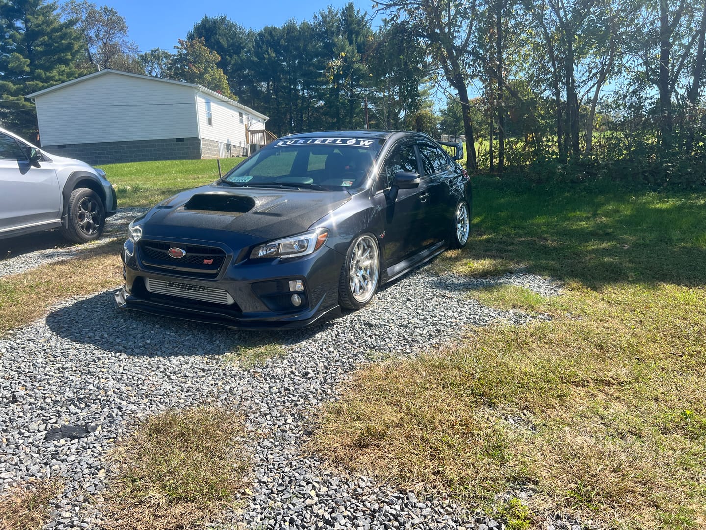 Customer photo review of SubieFlow Windshield Banners