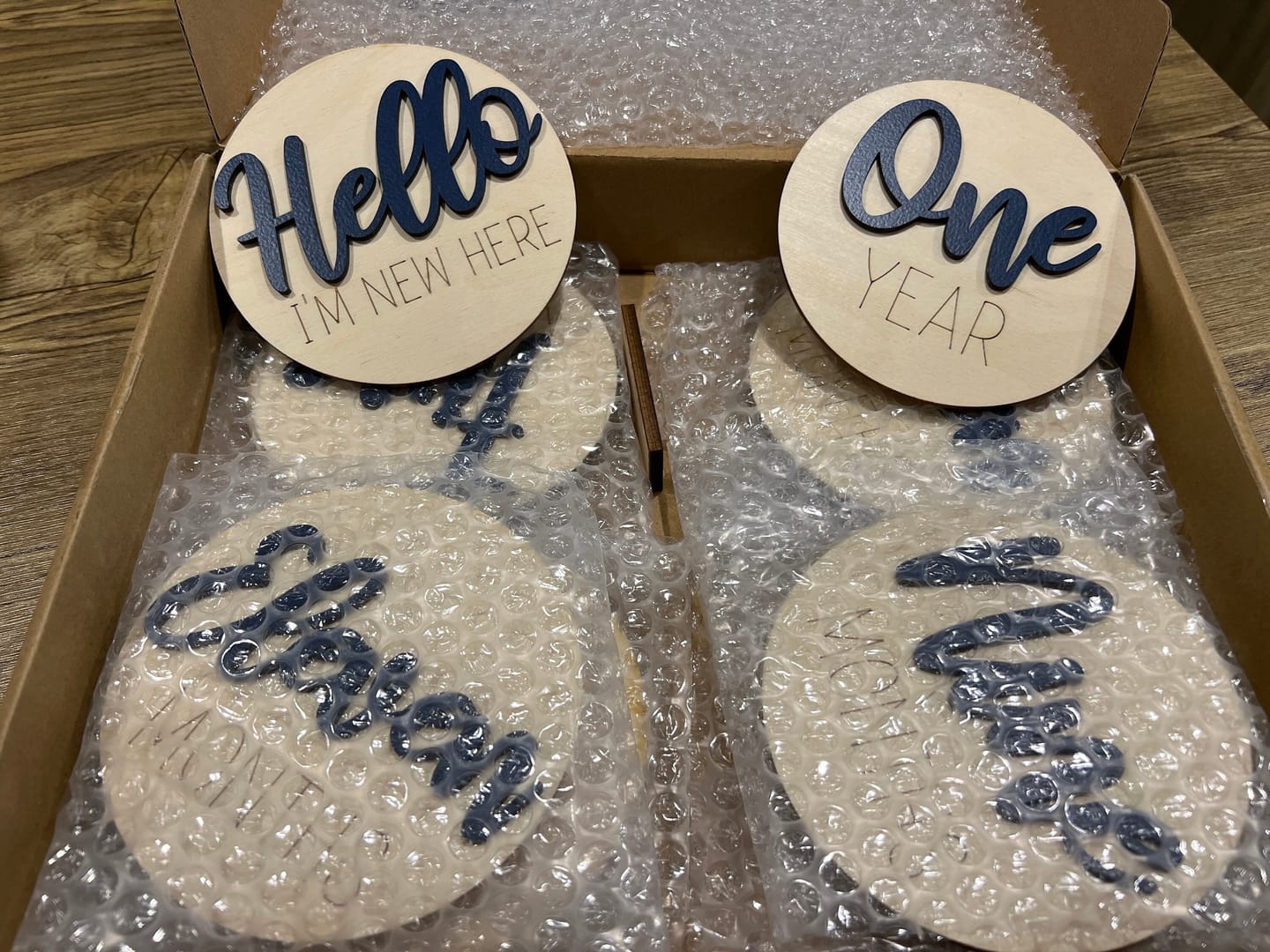 Customer photo review of Wooden Monthly Baby Milestones