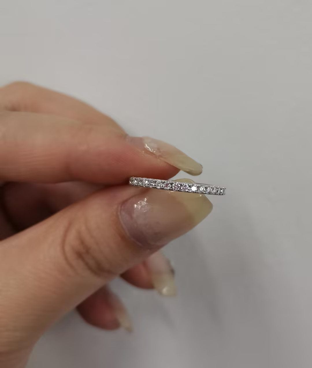 Customer photo review of Rodiffy Moissanite 0.5 Ct Full Eternity Thin Wedding Band For Women