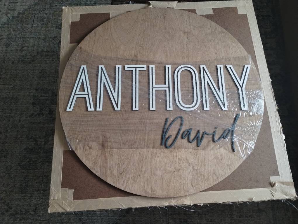 Customer photo review of Round Nursery Name Sign
