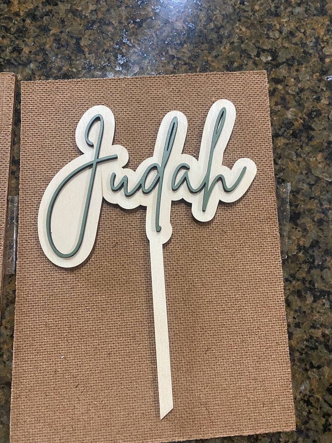 Customer photo review of Name Cake Topper