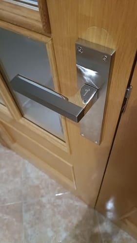 Customer photo review of Manillón de zamak en acabado grafito con roseta cuadrada modelo 844 para puertas