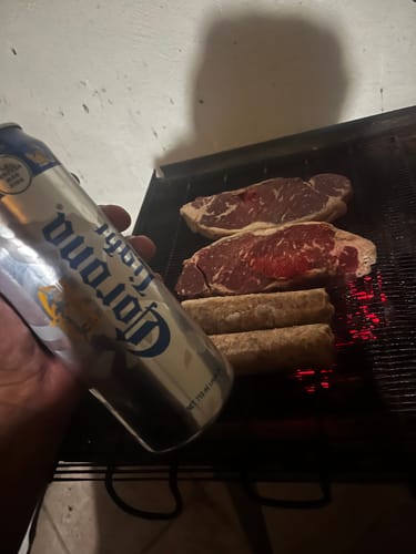 Reseña con foto de un cliente sobre New York Steak