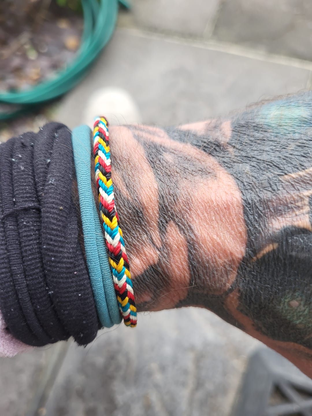 Customer photo review of Buddha Stones Tibet Handmade Five Color Thread Protection Braid String Bracelet