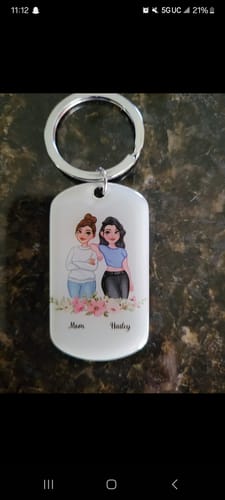 Customer photo review of Personalized The Love Between a Mother & Daughter is Forever Stainless Steel Keychain