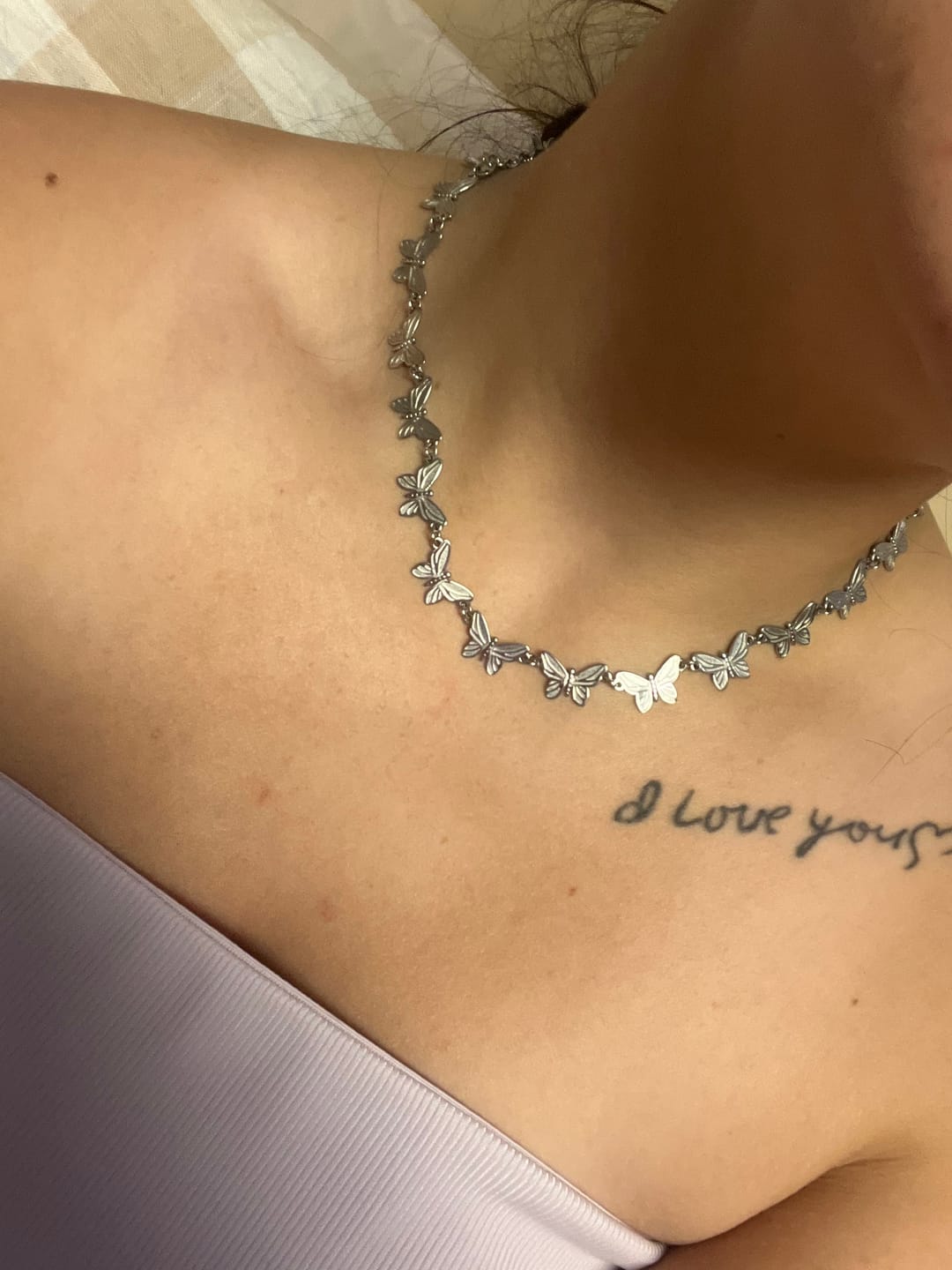 Customer photo review of BUTTERFLY NECKLACE