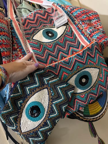 Customer photo review of Evil Eye Good Luck Clutch with Removable Crossbody Chain