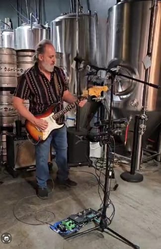 Customer photo review of Men's Retro Black Striped Print Button Up 70s Vintage Short Sleeve Western Shirt