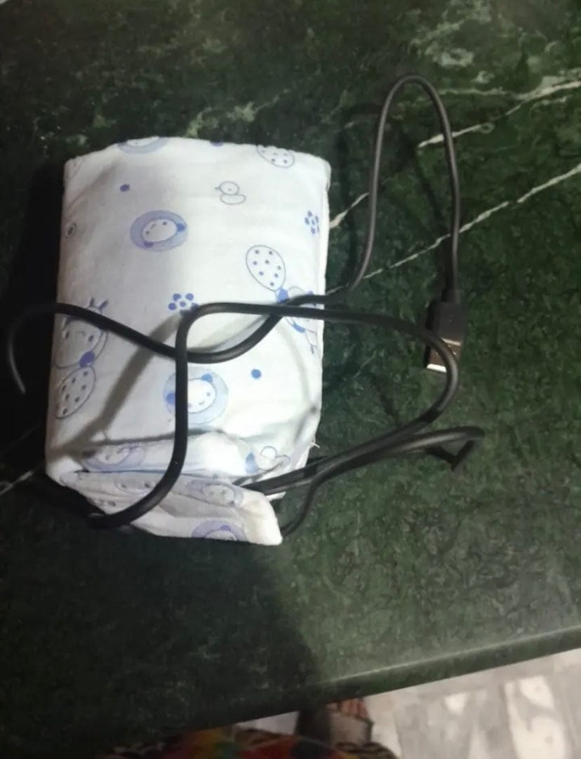 Customer photo review of Baby Bottle Heating Thermostat Portable