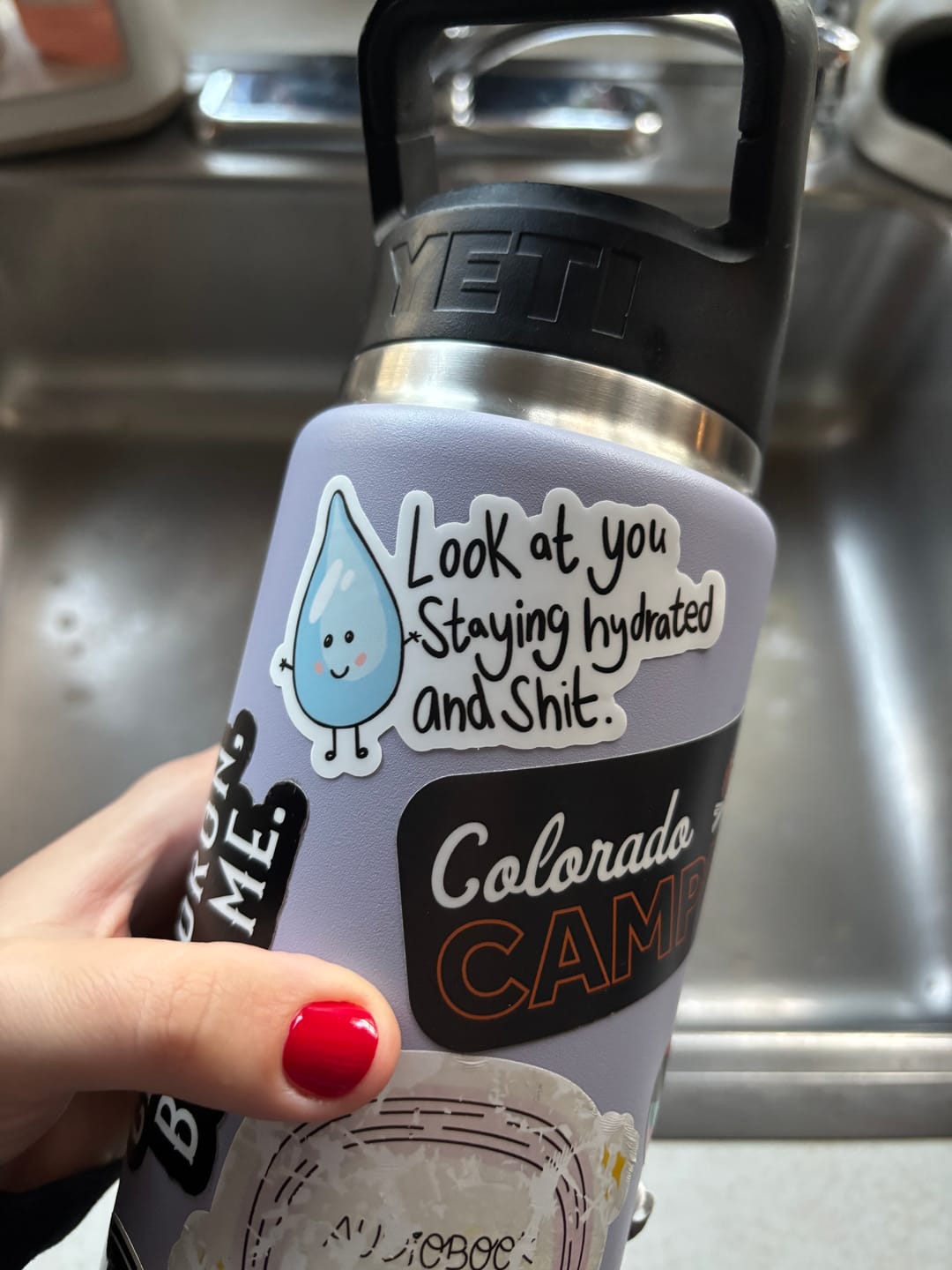Customer photo review of "Look At You Staying Hydrated And Shit" Water Bottle Sticker