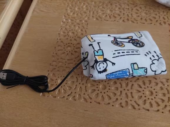 Customer photo review of Baby Bottle Heating Thermostat Portable