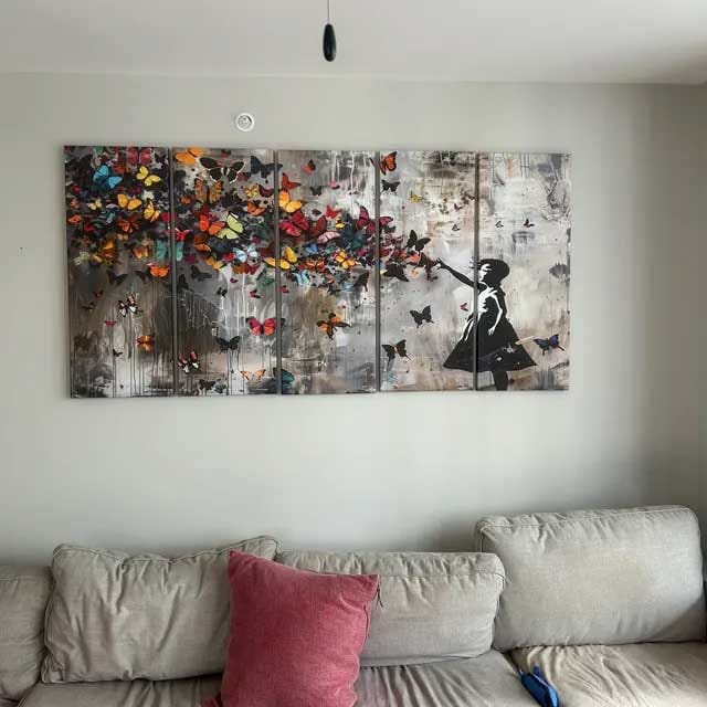 Customer photo review of Banksy Style Girl and Butterfly Explosion Wall Art Canvas Print | Girl with Butterflies Abstract Artwork | Vibrant Home Decor | Ready to Hang
