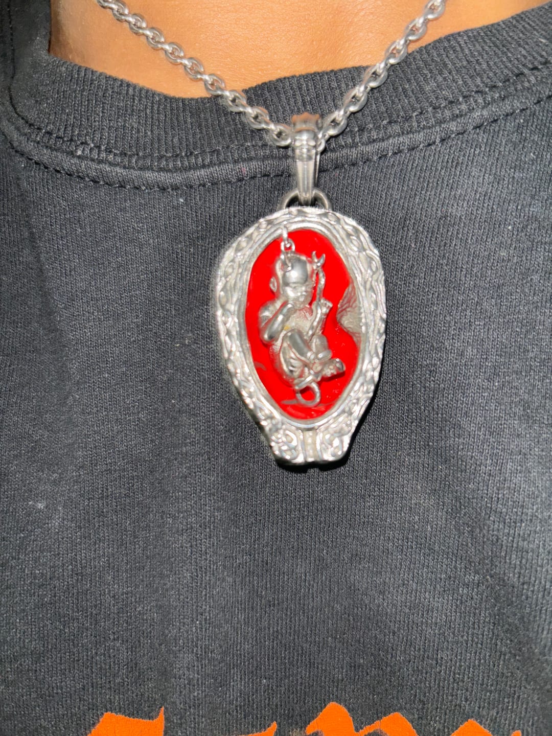 Customer photo review of DEVIL EMBRYO PENDANT