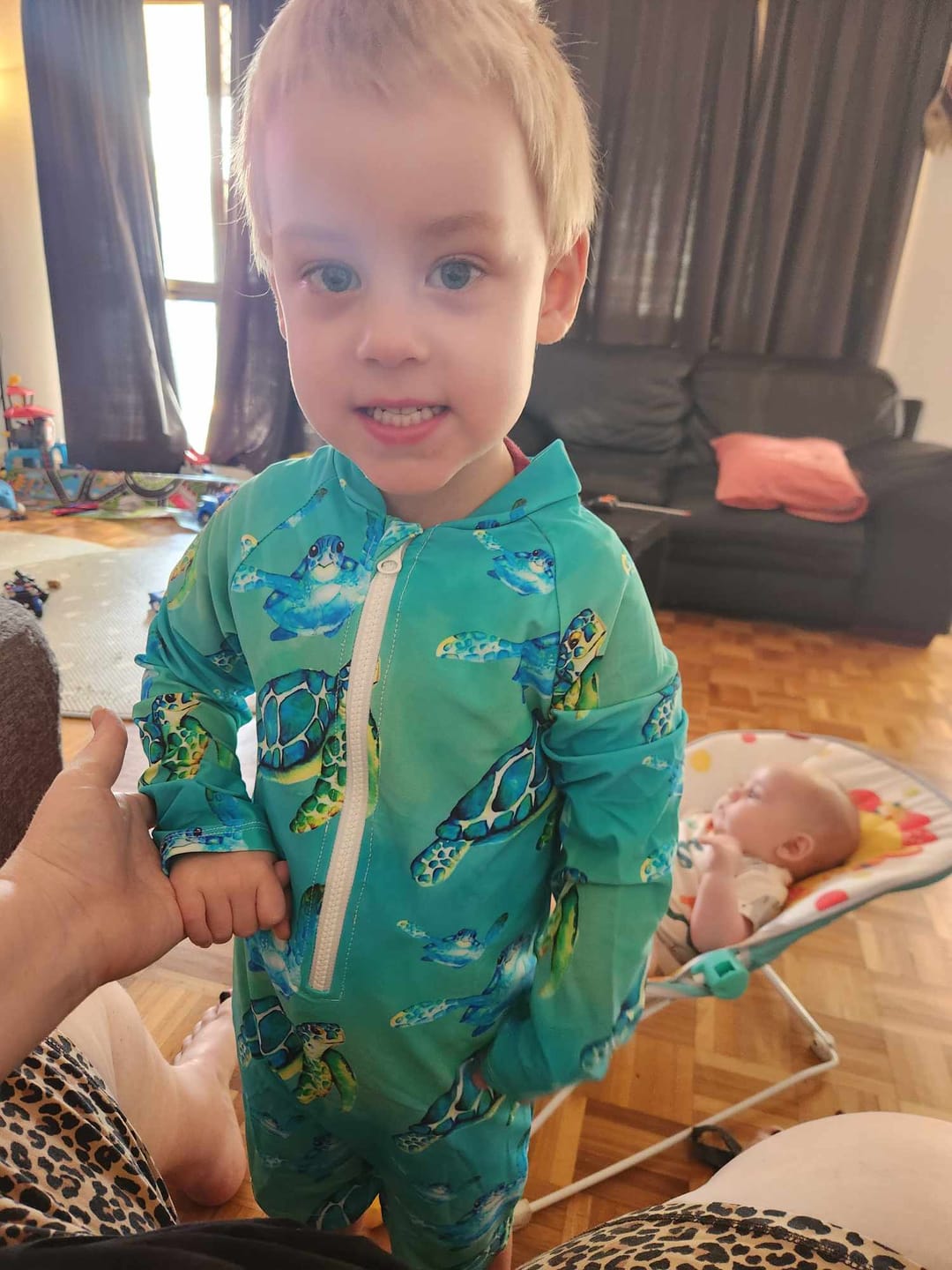 Customer photo review of Blue Turtle Unisex Long Sleeve Zip Swimmers